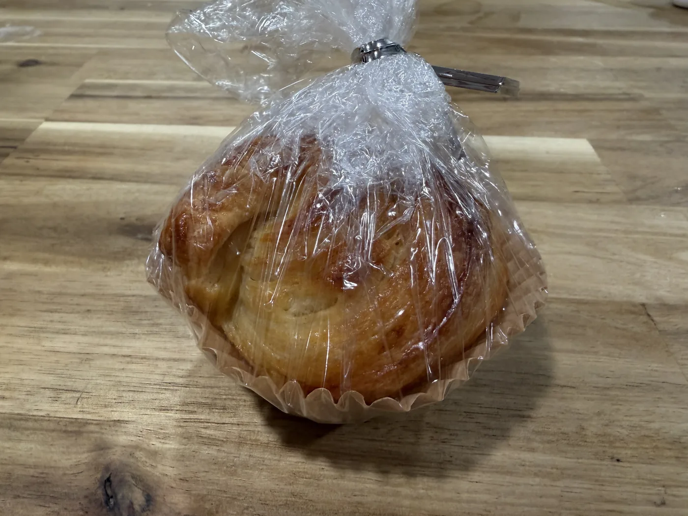 Croissant muffin wrapped for porch pickup