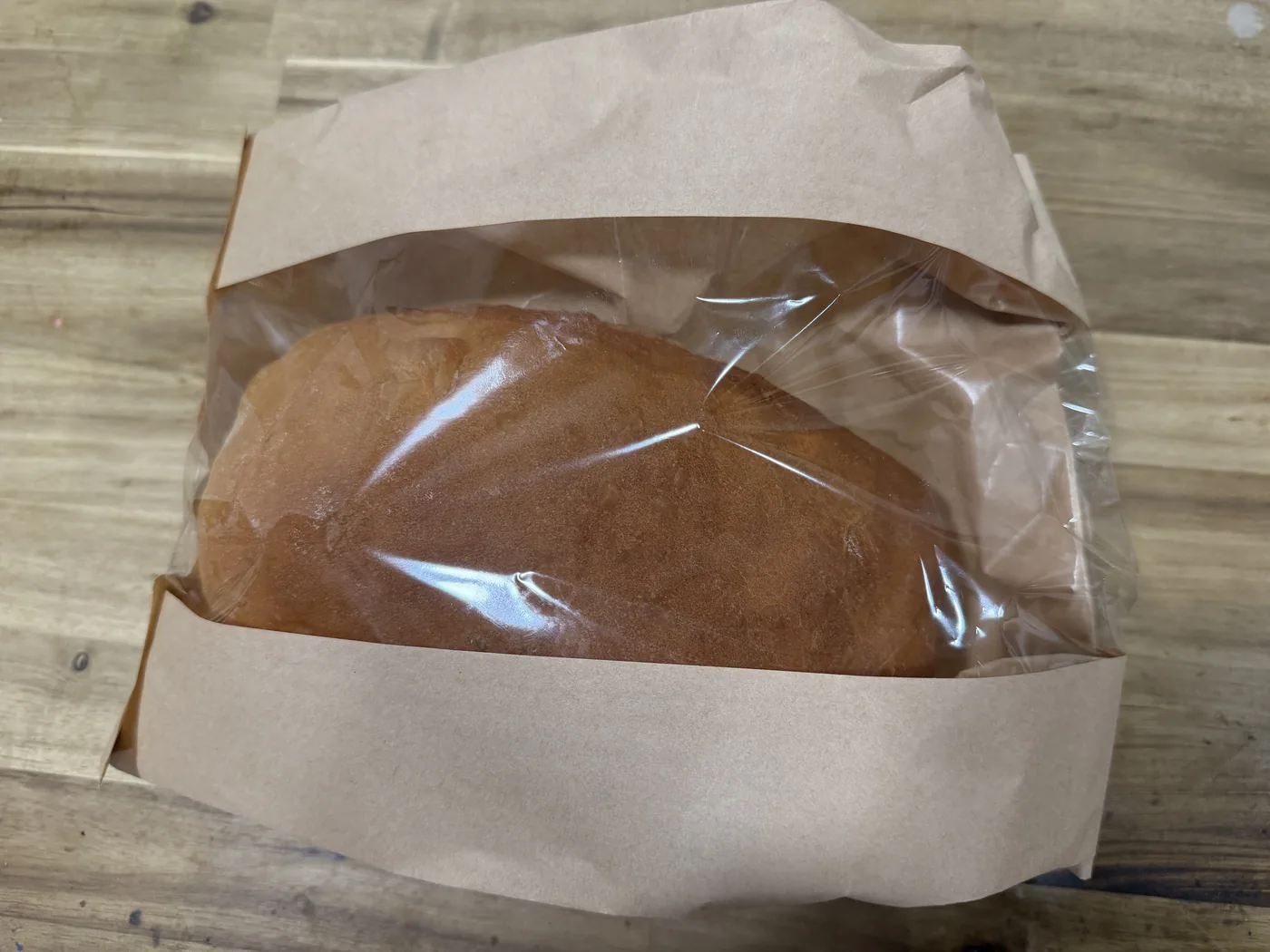 Sandwich bread loaf wrapped for porch pickup